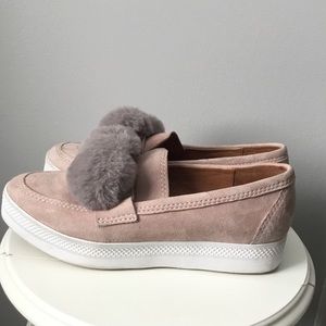 All black Pom Pom shoes